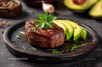 Juicy Beef Steak with Sliced Avocado and Fresh Parsley Garnish