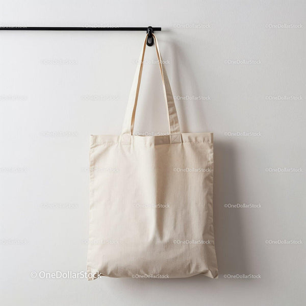 Empty Natural Cotton Tote Bag Hanging on Wall Hook JPG Mockup Image