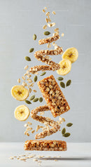 Floating granola bars with banana slices and seeds
