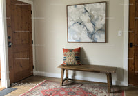 Simple Modern Entryway with Wooden Bench and Abstract Wall Art