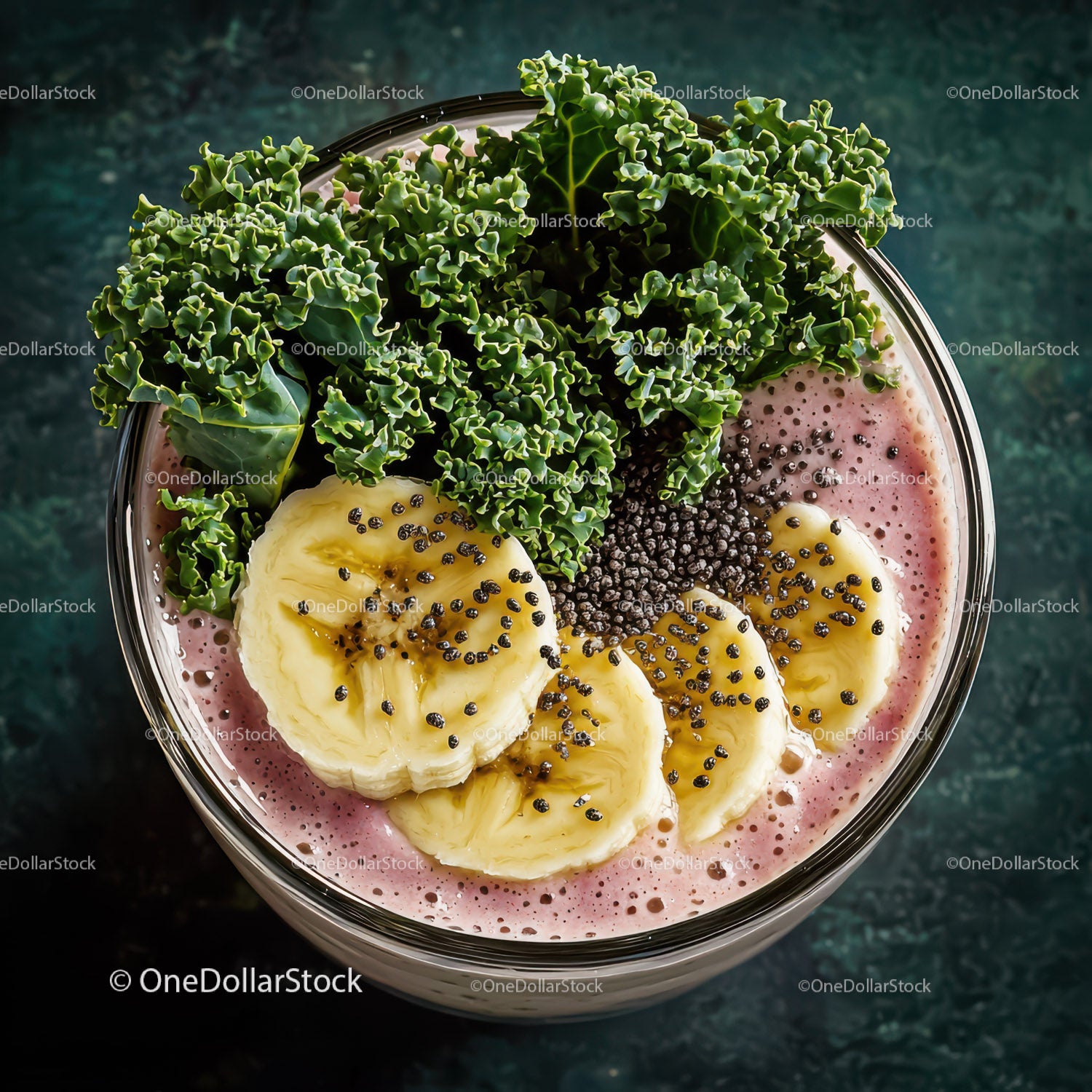 Banana Slices with Kale and Chia Seeds in Vibrant Pink Smoothie