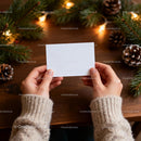 Hands Holding Blank Card with Festive Pine and Lights JPG Mockup Image preview