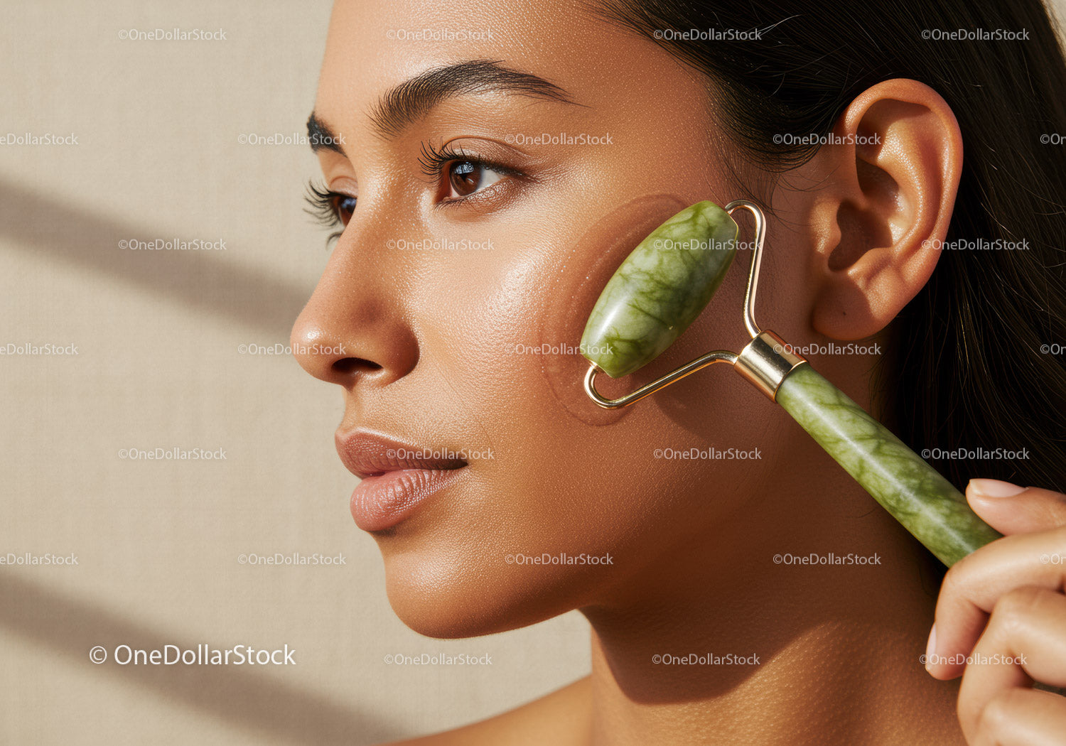 Close-Up of Asian Woman Receiving Facial Massage with Jade Roller