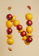 Creative fruit arrangement with oranges and red apples