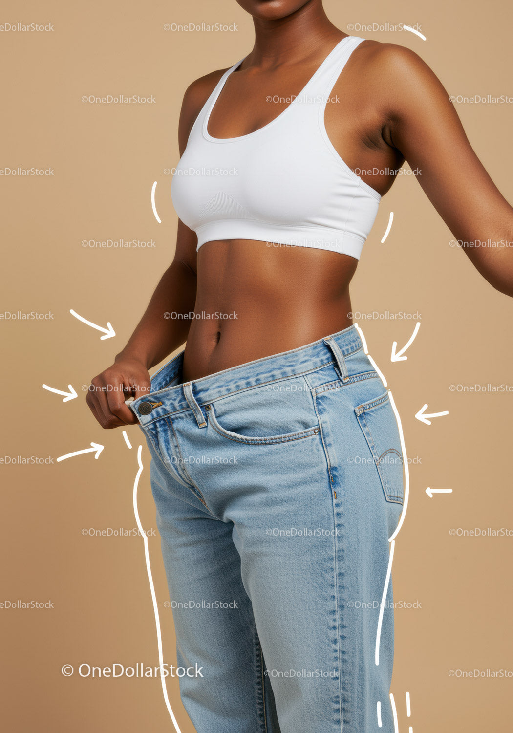 Woman Comparing Waist Size with Oversized Jeans for Weight Loss Motivation