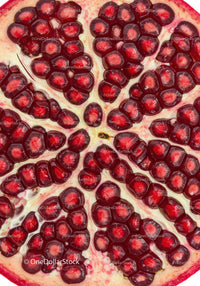 Close up of fresh pomegranate seeds inside fruit