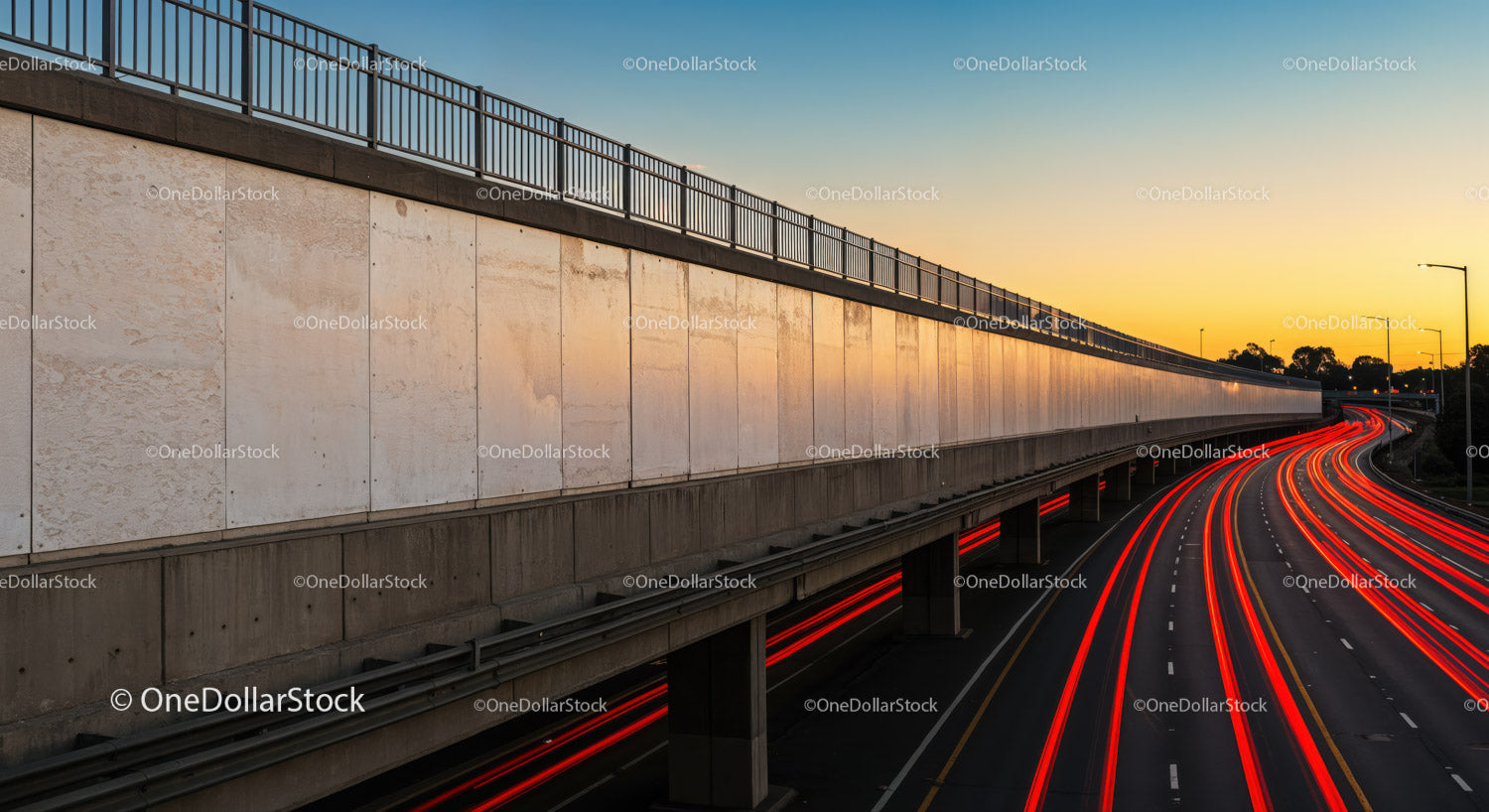 Urban Highway with Light Trails at Sunset