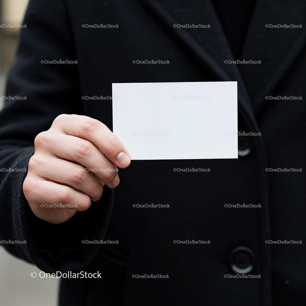 Person Holding Blank White Business Card Outdoors JPG Mockup Image