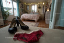 Chic Black Heels and a Red Lace Dress in a Cozy Bedroom Setting