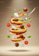 Floating rigatoni pasta with meatballs and fresh ingredients