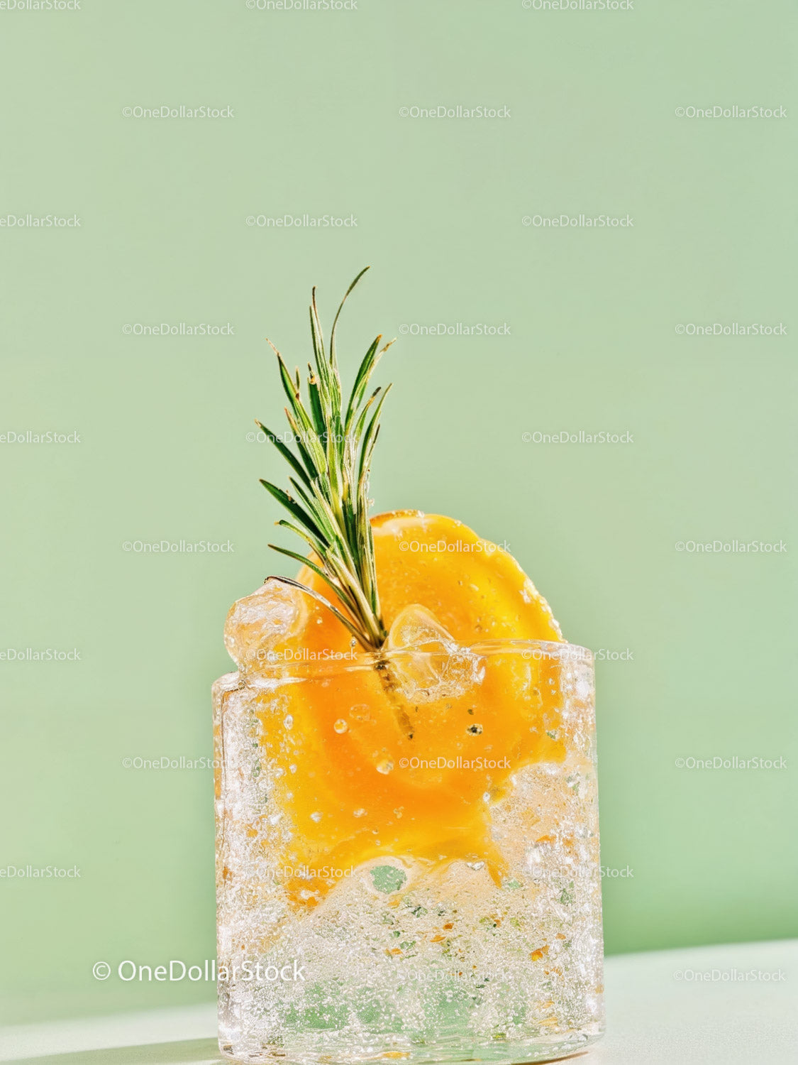 Refreshing Peach Cocktail with Rosemary Garnish