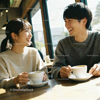 Couple sharing warm moments over coffee in cozy cafe