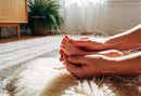 Gentle Touch of Parent Holding Baby Feet Indoors