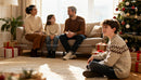 Family enjoying cozy Christmas morning at home