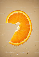 Fresh Orange Slice with Water Droplets on Beige Background