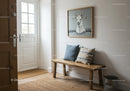 Rustic Modern Entryway with Wooden Bench and Artistic Deer Portrait