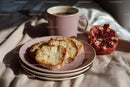 Fresh Bread Slices with Pomegranate and Coffee in Cozy Morning Setting