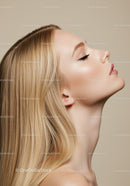 Profile of serene woman with flawless skin and blonde hair
