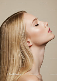 Profile of serene woman with flawless skin and blonde hair