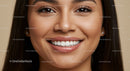 Close up of smiling woman with flawless skin and teeth