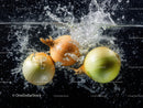 Fresh Onion Bulbs with Water Splash in Dynamic Kitchen Scene