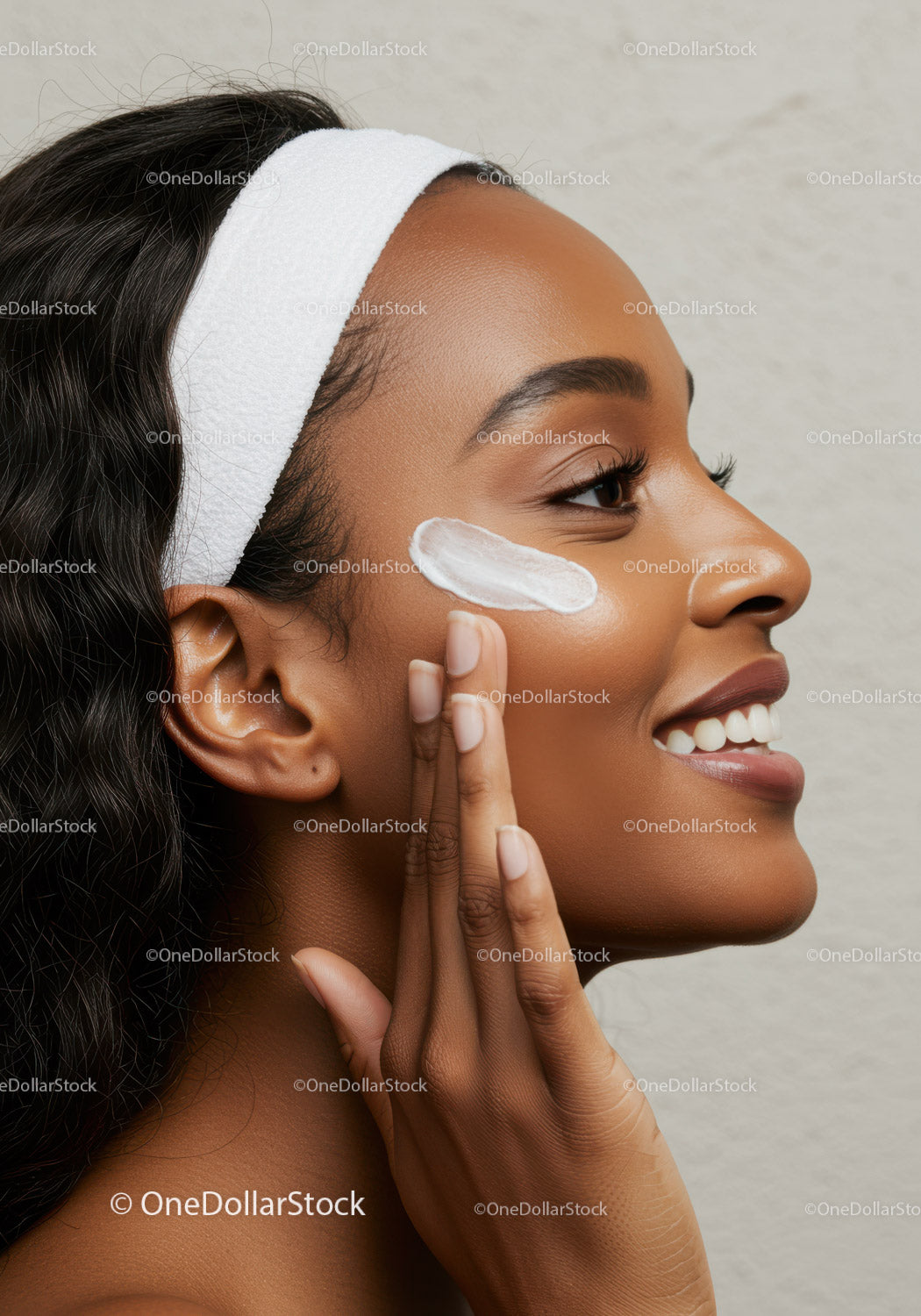 Woman Applying Face Cream for Glowing Smooth Skin