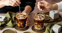 Refreshing Iced Coffee with Cream in Two Glasses for Summer Lifestyle