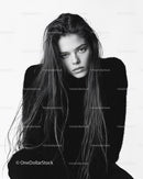 Black and White Portrait of Young Woman with Wet Hair in Studio