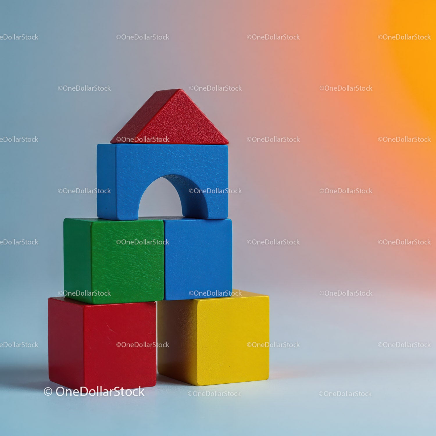 Colorful Wooden Building Blocks Arranged in a Creative Stack