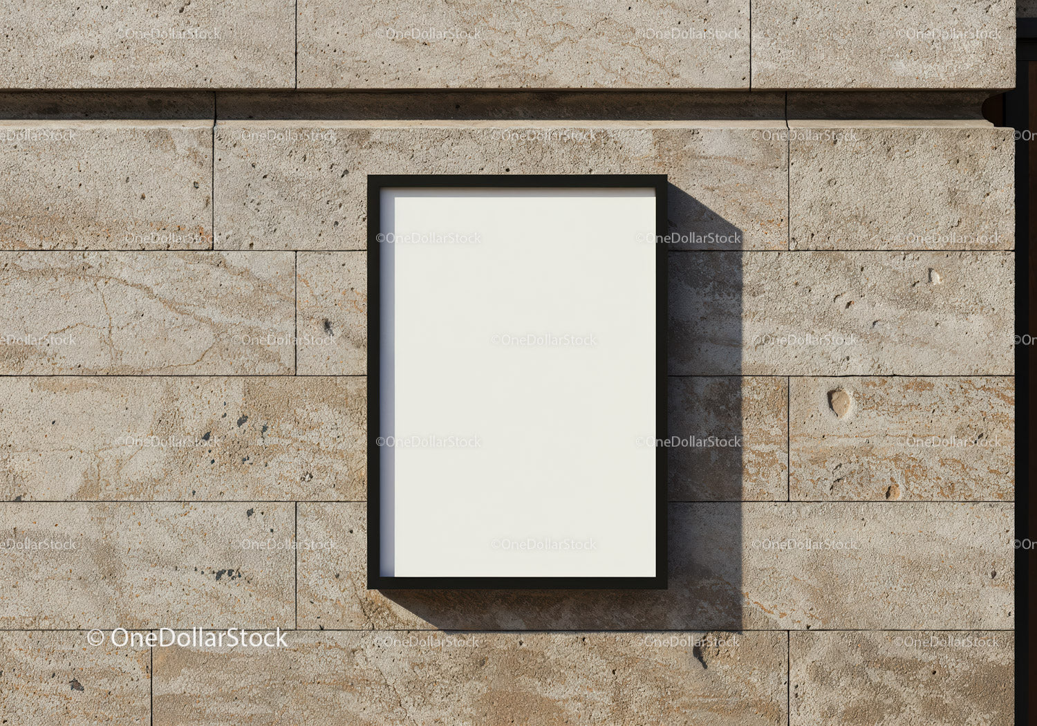 Empty Black Frame on Textured Stone Wall