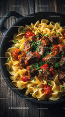 Hearty Beef and Cherry Tomato Pasta in Rustic Skillet