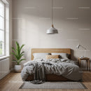 Minimalist Bedroom with Gray Bedding and Houseplant in Natural Light