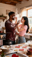 Couple Playfully Baking Heart Shaped Cookies Together