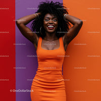 Vibrant Woman in Orange Dress Smiling Against Colorful Wall