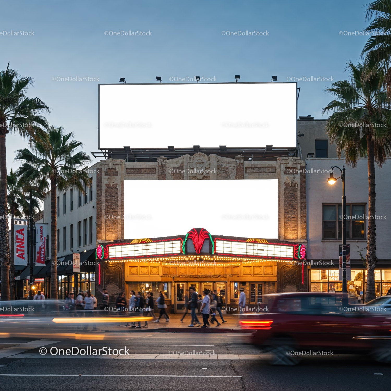 Historic theater facade with illuminated marquee at dusk