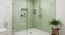 Modern bathroom with glass shower and brass fixtures