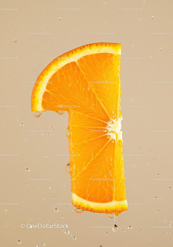 Fresh orange slice shaped as number one in water
