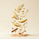 Fresh Pear Slices and Spices Floating on Light Background