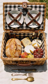 Rustic Picnic Basket with Cheese, Bread and Fresh Fruit