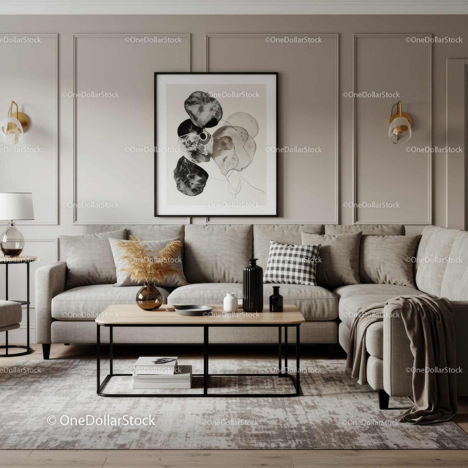 Elegancki, nowoczesny salon z beżową sofą i abstrakcyjną grafiką ścienną