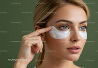 Close-up of a woman with under-eye patches performing skincare routine