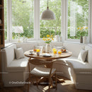 Cozy breakfast nook with natural light and greenery view
