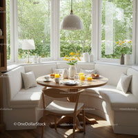 Cozy breakfast nook with natural light and greenery view