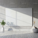 Minimalist interior with blank canvas and plants