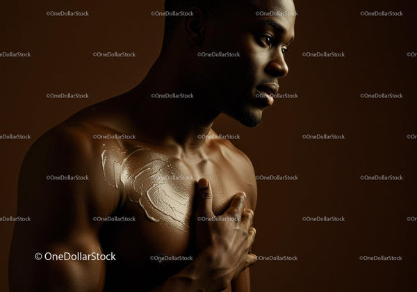 Elegant Male Model with Smooth Skin and Strong Shoulder in Artistic Shot