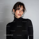 Stylish Young Woman in Black Turtleneck with Hoop Earrings