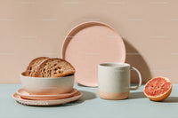 Stylish Breakfast Plate with Whole Grain Bread and Fresh Grapefruit
