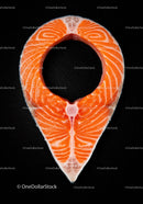 Raw salmon steak shaped like location pin on black background