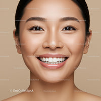 Closeup of happy woman with flawless skin and bright smile