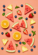 Fresh summer fruits assortment on peach background